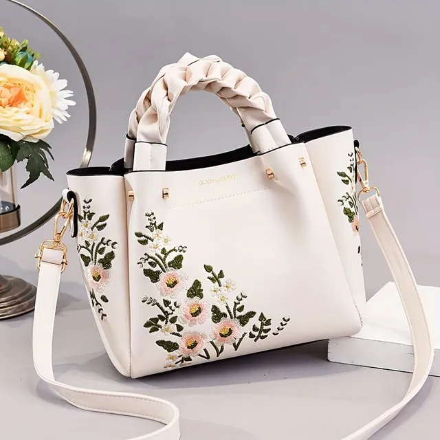 Elegant bag with floral embroidery and removable strap