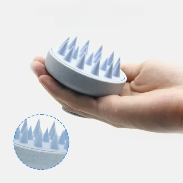 Special sicon massage brush for application of oil into the hair skin and for their faster growth