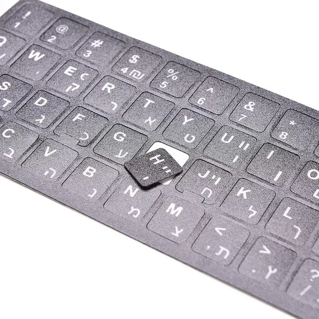 Stick-on letters on the keyboard