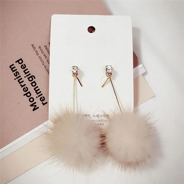 Beautiful ladies dangle earrings with plush Truman ball