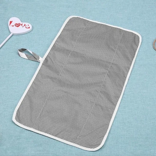 Portable changing pad