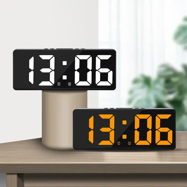 Digital alarm clock with LED display and temperature