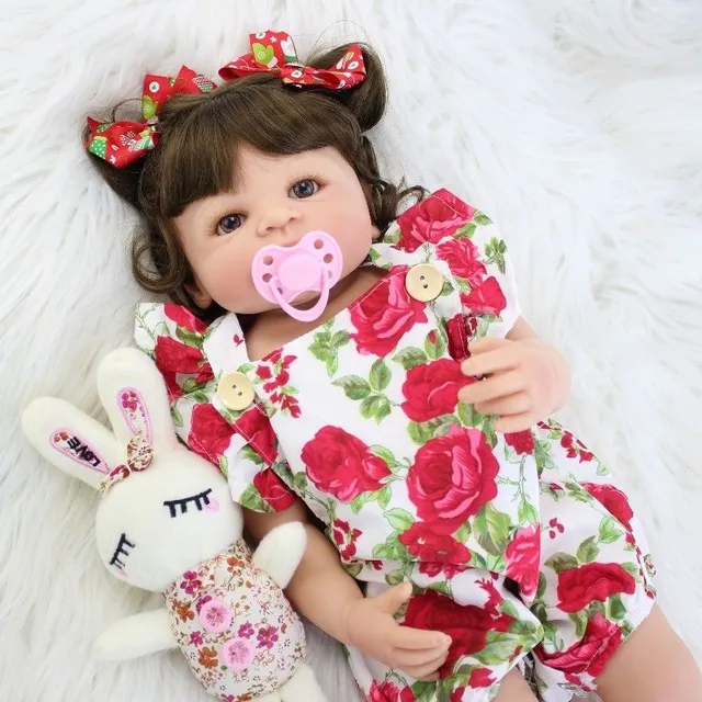 Realistic doll with accessories 55 cm