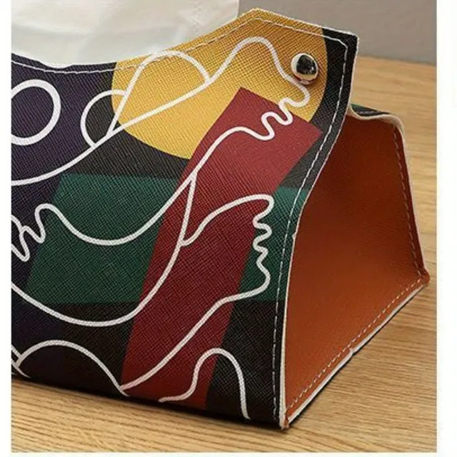 Practical handkerchief holder with storage space and abstract design