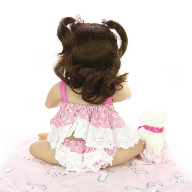 Realistic doll with accessories 57 cm