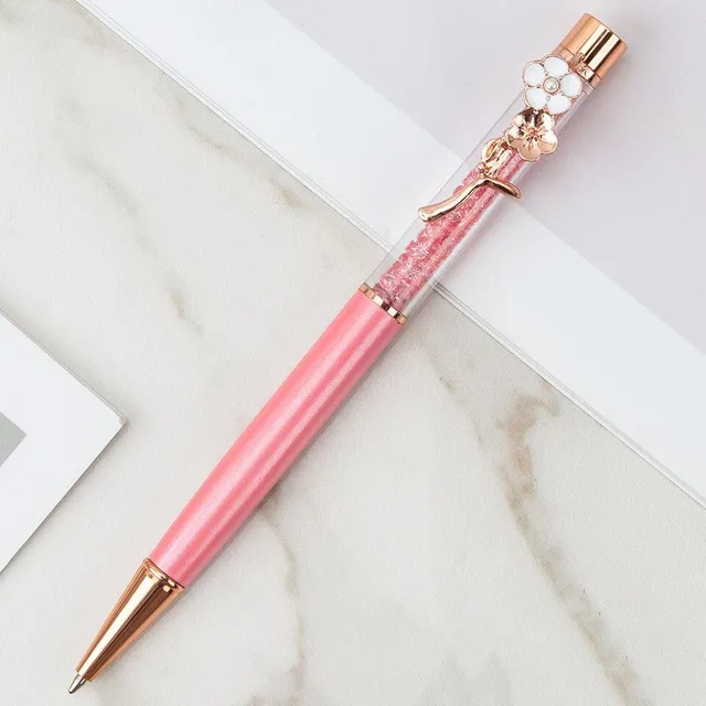 Designer office pen with luxurious flower-shaped decoration and glitters