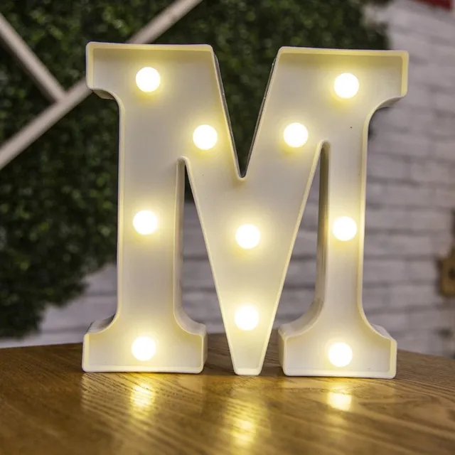 Lampă LED stilizată în formă de literă și cifră