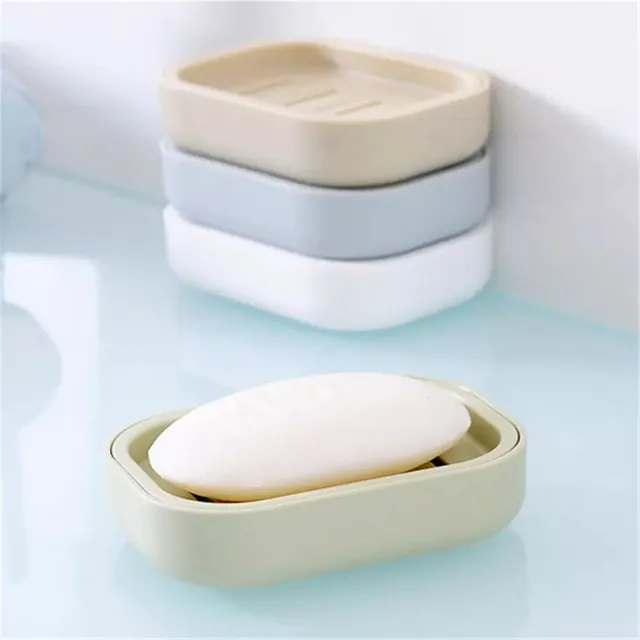 Two-layer elegant drain container for soap