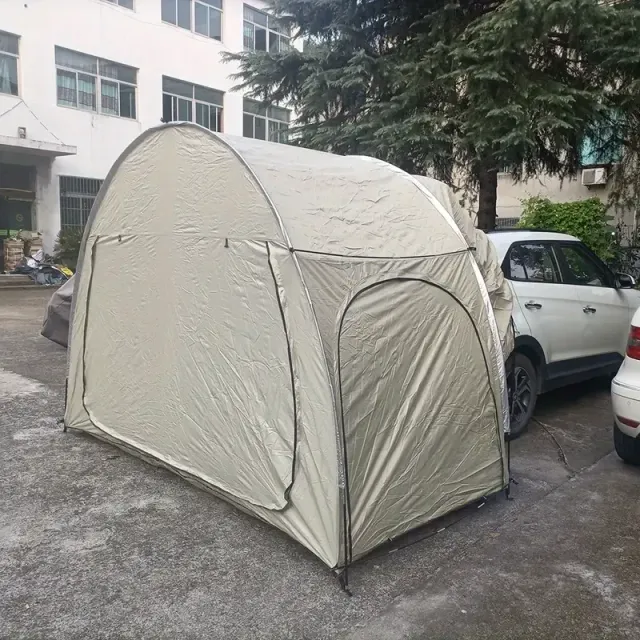 Tent for car for rear moving for camping on the wild, with sun and rain protection, fast layout