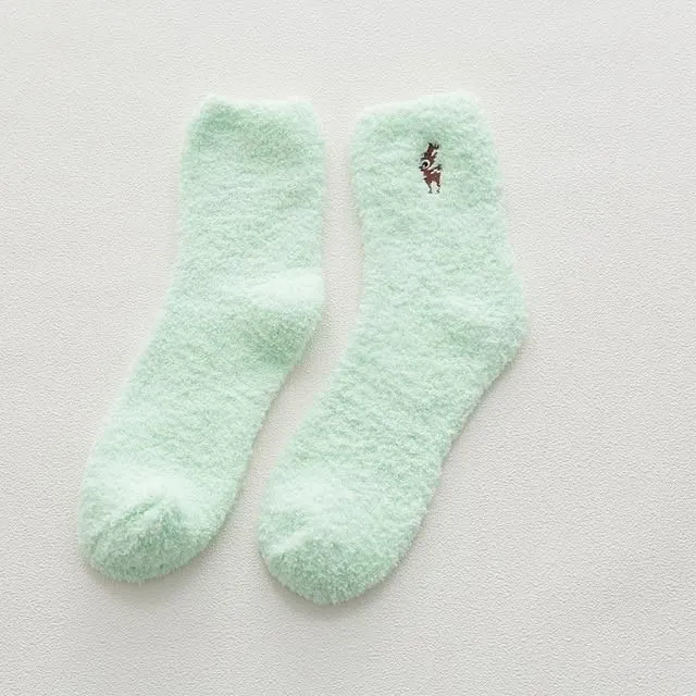 Warm socks in the shape of a paw