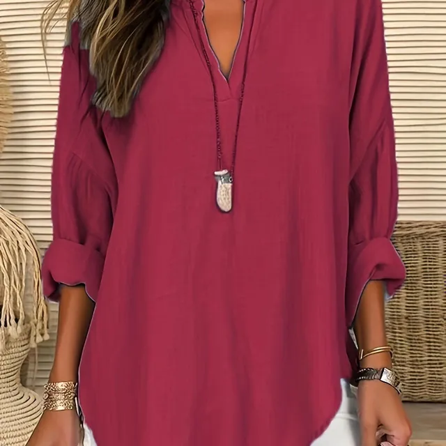 Women's leisure tunic with long sleeve and neckline to V in excessive size