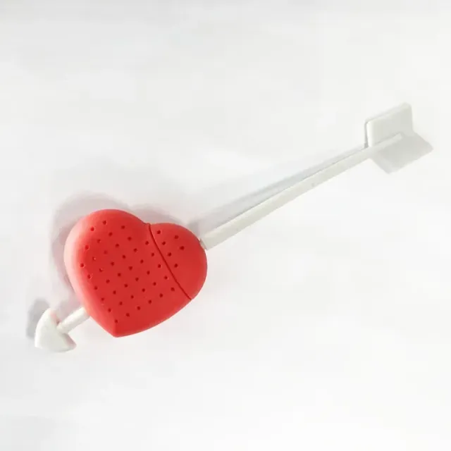 Designed silicone tea sieve in the shape of a heart pierced with an arrow of love