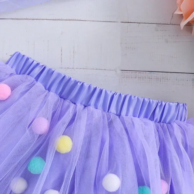 Girl's tutu skirt in tulle with colourful plush balls