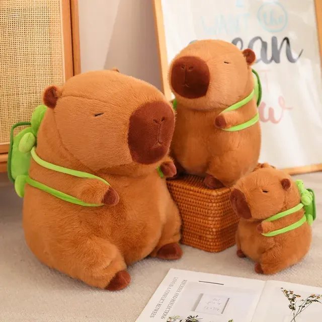 Cute capybara with backpack, stuffed toy, sitting, cute cartoon animals, stuffed doll