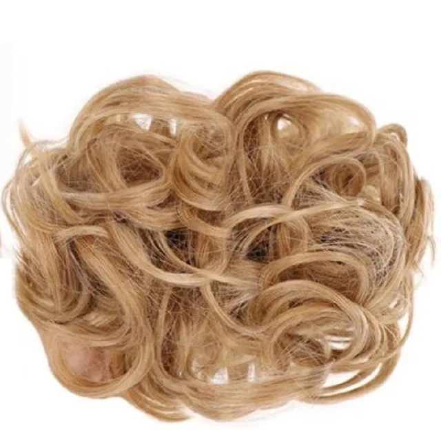 Curly hairpiece on the rack