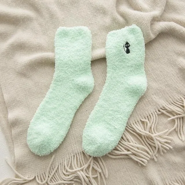 Warm socks in the shape of a paw