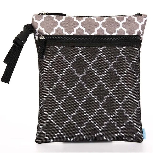 Diaper bag with double pocket