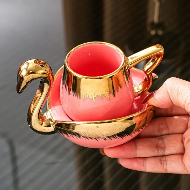 Elegant cup and saucer with swan, ceramic cup for coffee and saucer, drink with golden edge for breakfast, tea party, afternoon tea, home, garden, restaurant and more, drinks for summer and winter