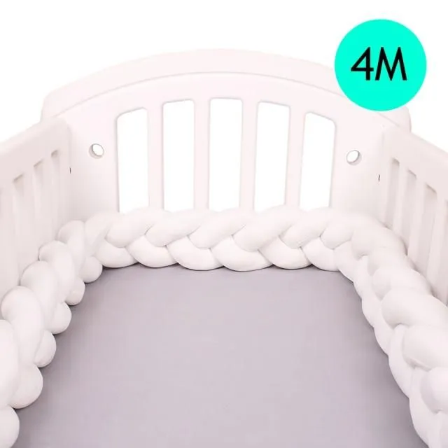 Crib mattress cover in the shape of a braid