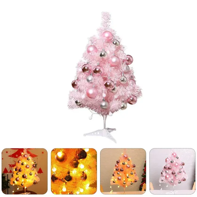Set of cute Christmas tree on table in pink color and decorations