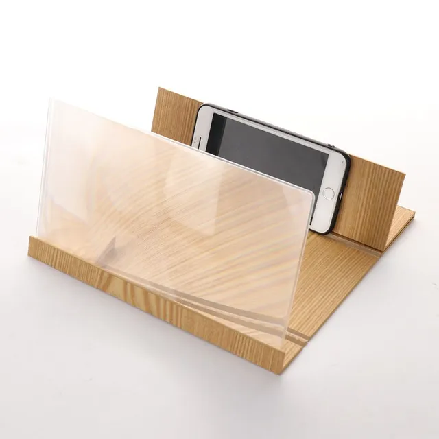 Folding stand for telephone with magnifying glass