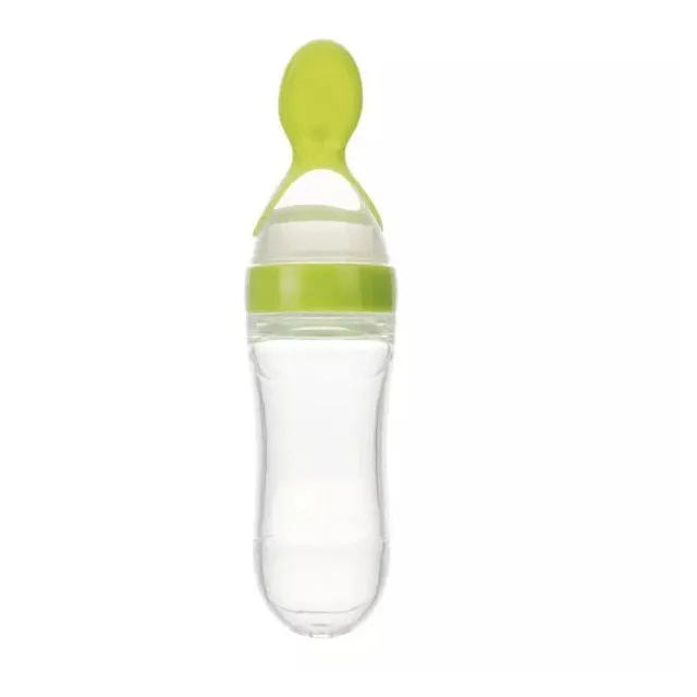 Baby bottle with spoon for feeding