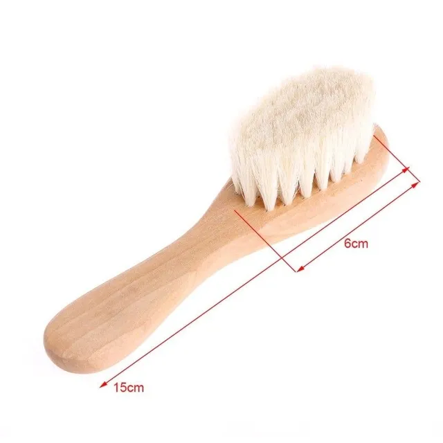 Brosse pour les premiers cheveux de bébé