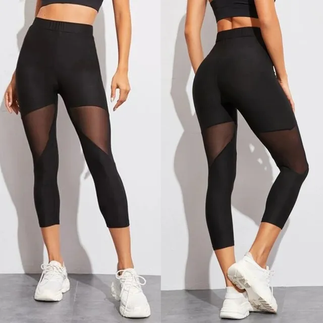 Women's modern trendy sports elastic leggings with meshed detail on their pants