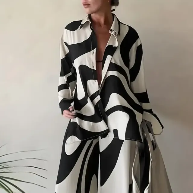 Women's two-piece set in excessive size - abstract striped printing, shirt with long sleeves and collar, trousers with high waist and wide pants