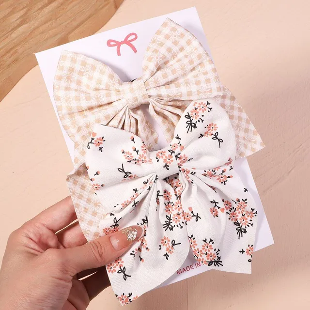 Cute modern baby hair clip with perfect bow motif - more variants