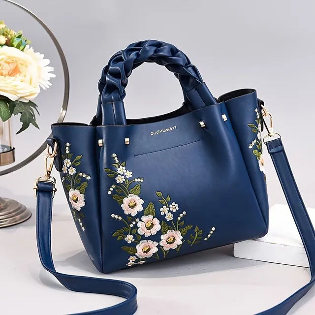 Elegant bag with floral embroidery and removable strap