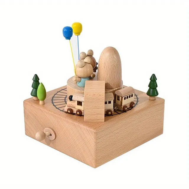 Wooden music box with rotating bears and train