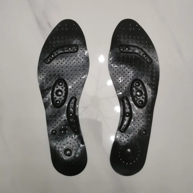 Magnetic therapeutic shoe inserts