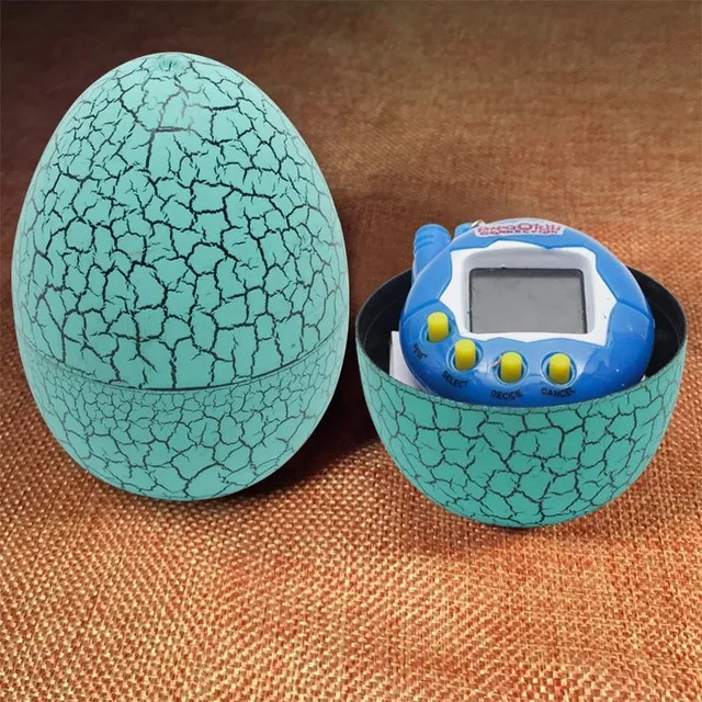 Baby retro toy Tamagotchi in dinosaur eggs