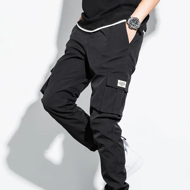 Men's black cargo pants with flap pockets