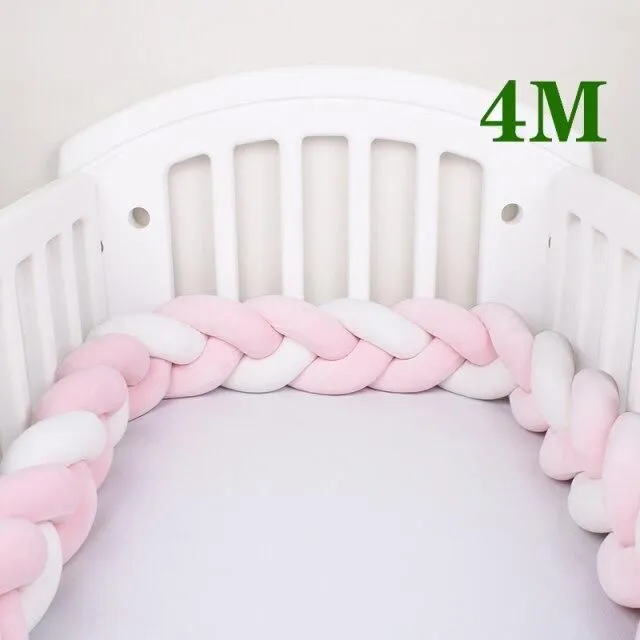 Crib mattress cover in the shape of a braid