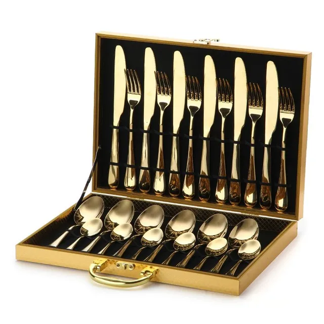 Set of gold cutlery in the trunk