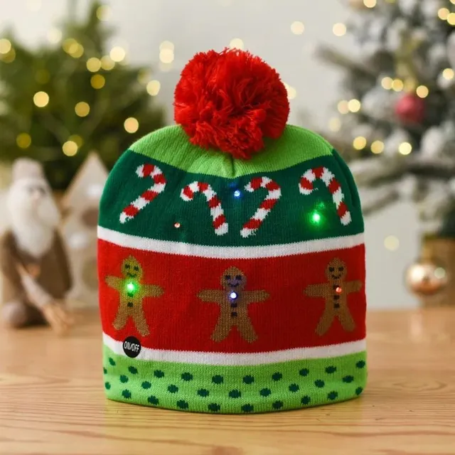 Świecąca czapka z pomponem i motywem świątecznym