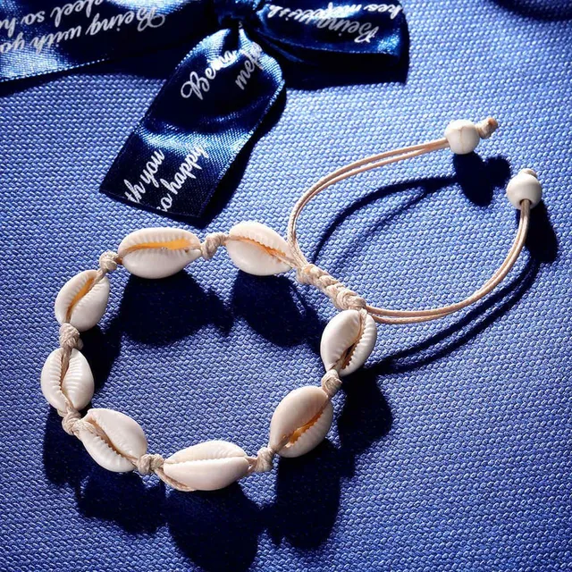 Bracelet made of shells on the leg