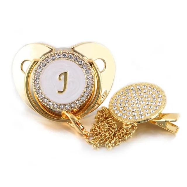 Beautiful pacifier with initials and rhinestones in gold