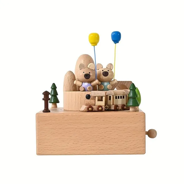 Wooden music box with rotating bears and train