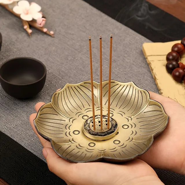 Elegant stand for scented sticks in the shape of a plum flower