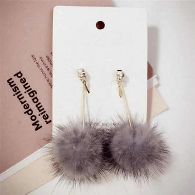 Beautiful ladies dangle earrings with plush Truman ball