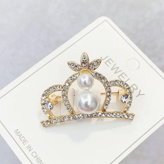Beautiful luxury brooches in the shape of a crown