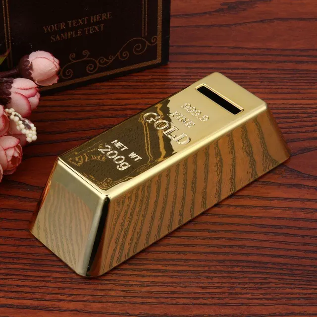 Practical cash box in the shape of a golden brick