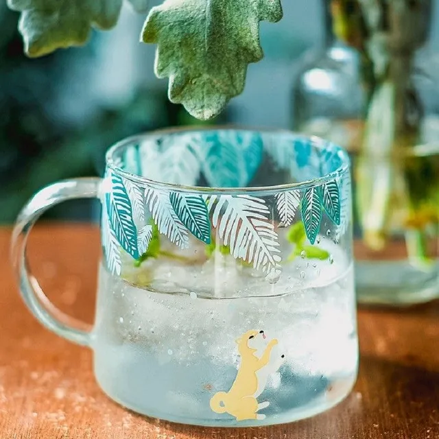 Glass mug with animals