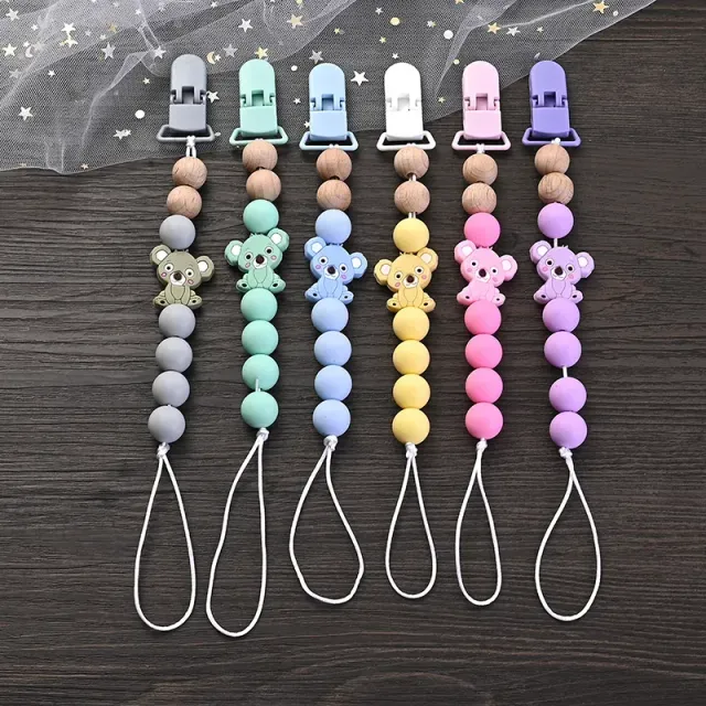 Silicone pacifier clip with bite and pet motif