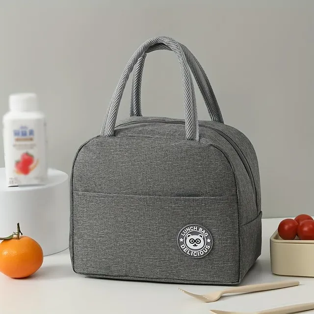 Practical insulated lunch bag with cheerful motif, handles and thermal insulation