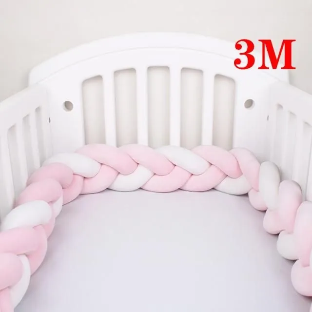 Crib mattress cover in the shape of a braid