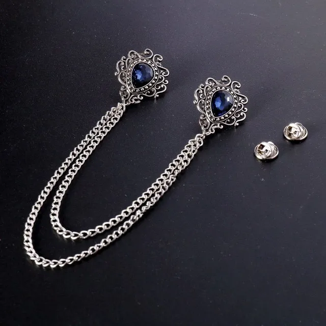 Stylish modern double-headed brooch with chain